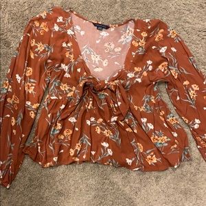 Floral top with adjustable tie